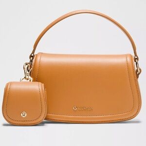 Lululemon Leather Alternative Mini Bag 1.2L Color Chestnut Brown/Gold